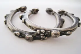 Matching Pair of Small Nubian Silver Currency Bracelets